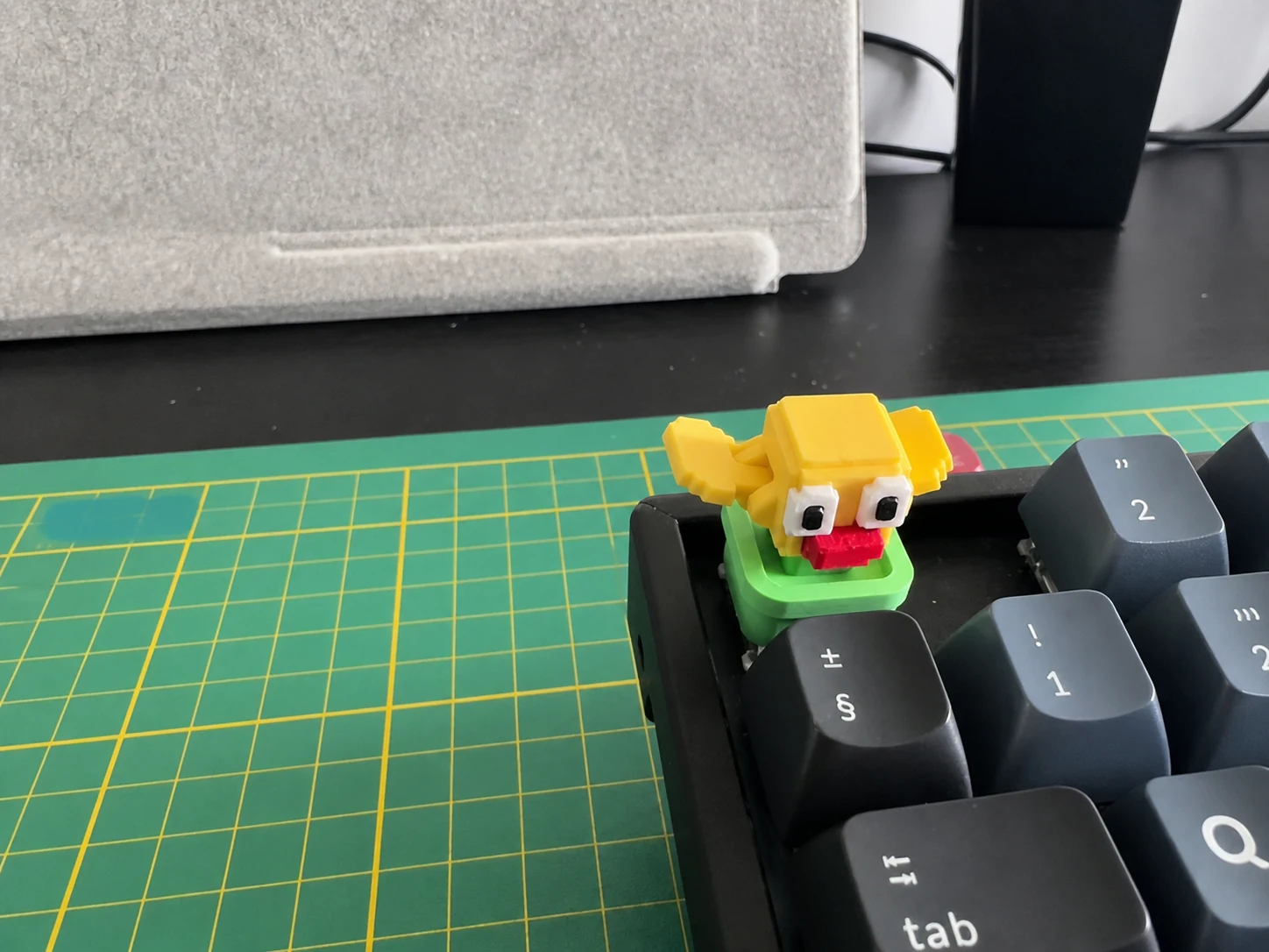 Tecla Escape con pajarito