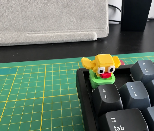 Tecla Escape con pajarito